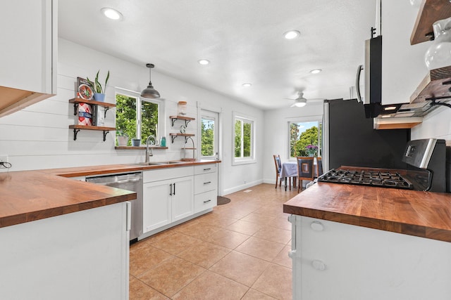 1575 Fig Ave, Redding, CA 96001 - kitchen featuring wooden counters, stainless steel appliances, open shelves, white cabinets, and light tile patterned floors