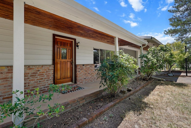 3639 E Keswick Dam Rd, Redding, CA 96003 - entrance to property with brick siding and a porch