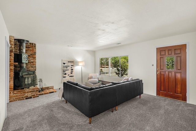 3639 E Keswick Dam Rd, Redding, CA 96003 - carpeted living room with a wood stove
