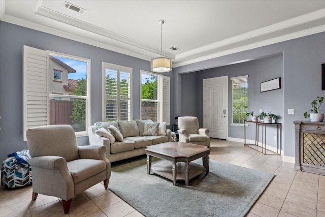 691 Rivercrest Pkwy, Redding, CA 96002 - living room with a tray ceiling, light tile patterned floors, and crown molding