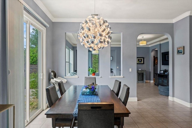 691 Rivercrest Pkwy, Redding, CA 96002 - dining room featuring arched walkways, healthy amount of natural light, tile patterned floors, and ornamental molding