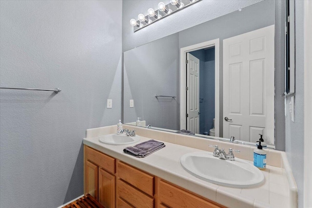 691 Rivercrest Pkwy, Redding, CA 96002 - full bath featuring double vanity and a textured wall