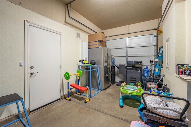 691 Rivercrest Pkwy, Redding, CA 96002 - garage featuring stainless steel refrigerator with ice dispenser
