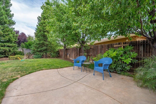691 Rivercrest Pkwy, Redding, CA 96002 - fenced backyard featuring a patio