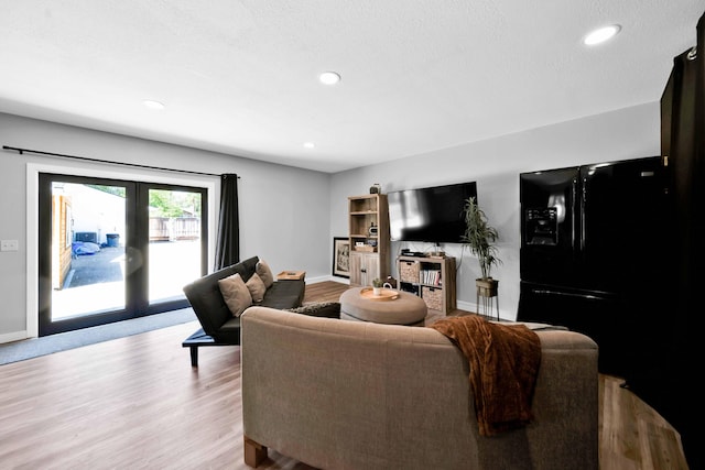 3075 Forest Hills Dr, Redding, CA 96002 - living area featuring light wood-style floors, recessed lighting, and french doors