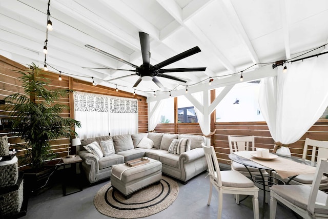 3075 Forest Hills Dr, Redding, CA 96002 - living area with concrete floors, a ceiling fan, wooden walls, and beamed ceiling