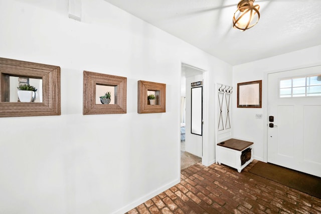 3075 Forest Hills Dr, Redding, CA 96002 - entryway featuring brick flooring and baseboards
