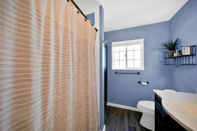 3075 Forest Hills Dr, Redding, CA 96002 - bathroom with vanity, wood finished floors, and a shower with curtain