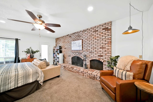 3075 Forest Hills Dr, Redding, CA 96002 - bedroom with a brick fireplace, carpet floors, recessed lighting, and ceiling fan