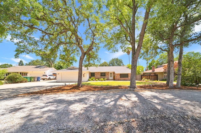 3075 Forest Hills Dr, Redding, CA 96002 - view of front of house featuring concrete driveway and an attached garage