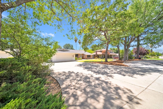 3075 Forest Hills Dr, Redding, CA 96002 - view of front of property with concrete driveway and a garage