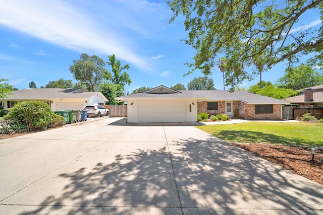 3075 Forest Hills Dr, Redding, CA 96002 - ranch-style home featuring driveway, a garage, and brick siding