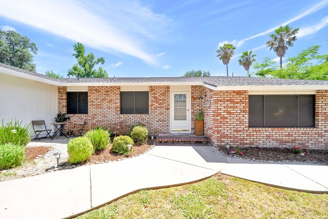 3075 Forest Hills Dr, Redding, CA 96002 - view of front facade featuring brick siding