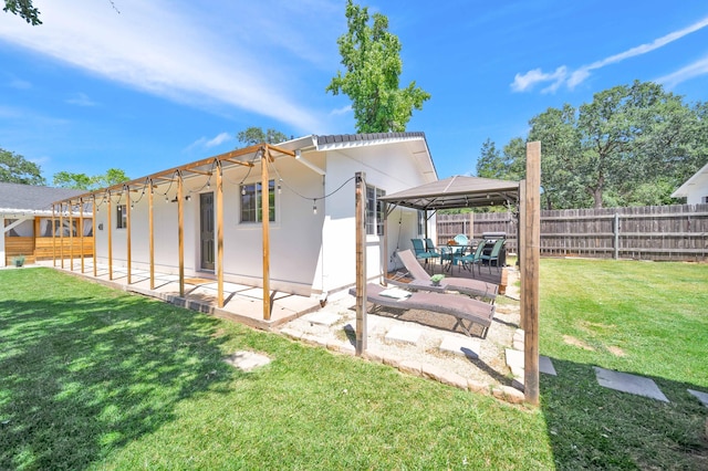 3075 Forest Hills Dr, Redding, CA 96002 - fenced backyard featuring a gazebo and a patio area