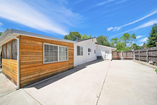 3075 Forest Hills Dr, Redding, CA 96002 - back of property with a patio and board and batten siding
