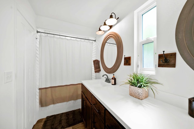 3075 Forest Hills Dr, Redding, CA 96002 - bathroom featuring double vanity and wood finished floors