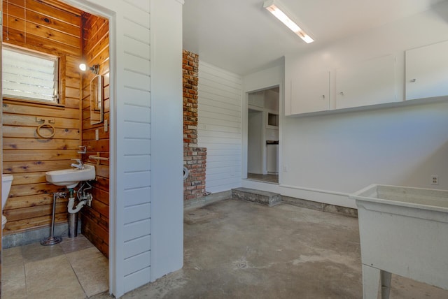 12194 Lake Blvd, Redding, CA 96001 - bathroom with wood walls and concrete floors