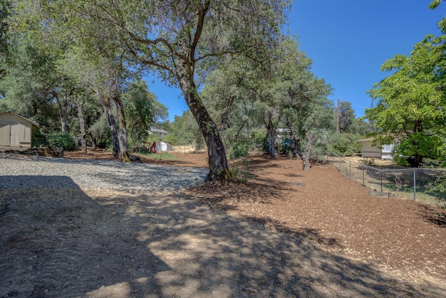 12194 Lake Blvd, Redding, CA 96001 - view of yard featuring a storage shed