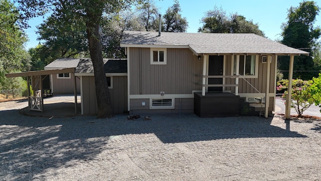 12194 Lake Blvd, Redding, CA 96001 - view of front facade featuring a shingled roof and a patio area