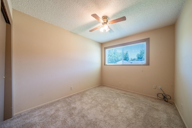 2076 Merle Dr, Redding, CA 96001 - carpeted empty room with ceiling fan and a textured ceiling