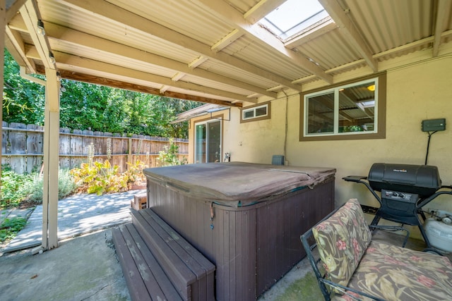 2076 Merle Dr, Redding, CA 96001 - view of patio / terrace with a hot tub and a grill