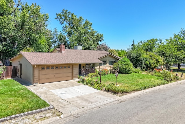 2076 Merle Dr, Redding, CA 96001 - single story home featuring a garage, driveway, a chimney, and roof with shingles