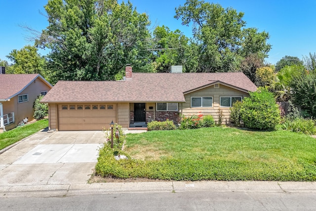 2076 Merle Dr, Redding, CA 96001 - single story home with an attached garage, a front yard, a chimney, concrete driveway, and a shingled roof