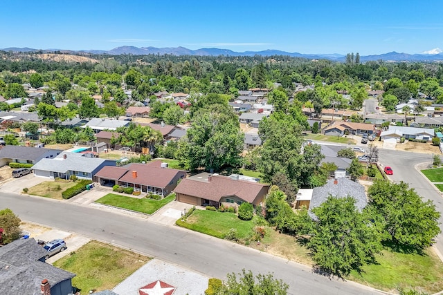 2076 Merle Dr, Redding, CA 96001 - aerial perspective of suburban area featuring a mountain backdrop