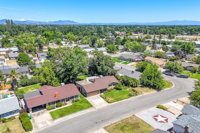 2076 Merle Dr, Redding, CA 96001 - aerial perspective of suburban area with a mountainous background