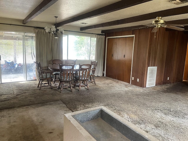 1110 Dusty Ln, Redding, CA 96002 - dining area with carpet floors, beam ceiling, healthy amount of natural light, a chandelier, and a ceiling fan