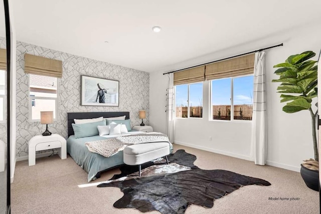876 Wind Cove Dr, Redding, CA 96001 - carpeted bedroom with multiple windows and an accent wall