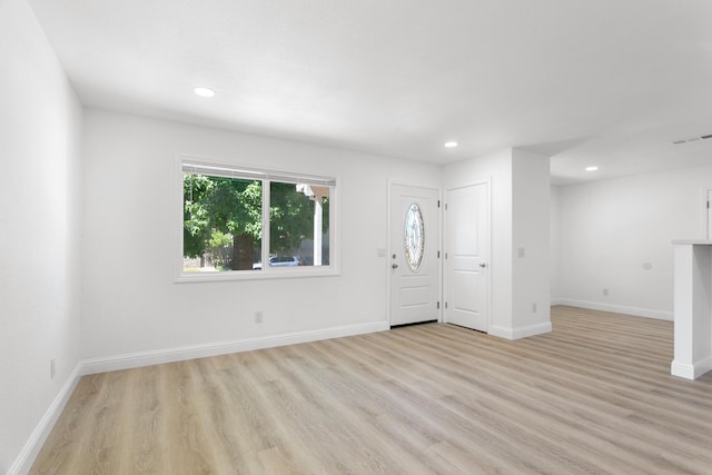 2445 Toyon St, Anderson, CA 96007 - entrance foyer with light wood-style flooring and recessed lighting