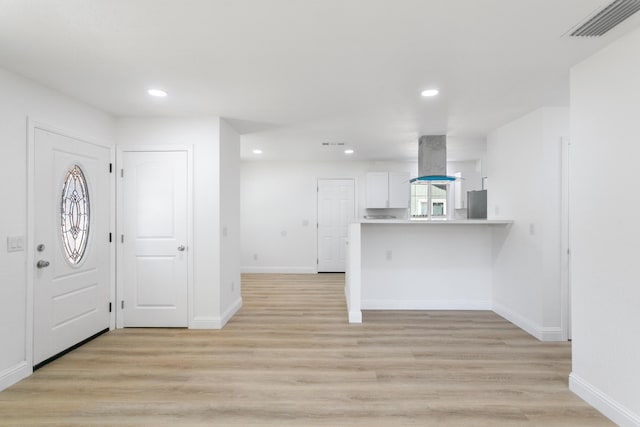 2445 Toyon St, Anderson, CA 96007 - foyer featuring light wood-style flooring and recessed lighting