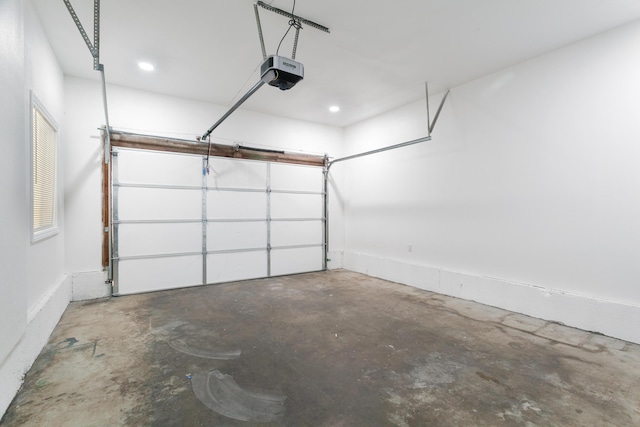 2445 Toyon St, Anderson, CA 96007 - garage with a garage door opener and recessed lighting