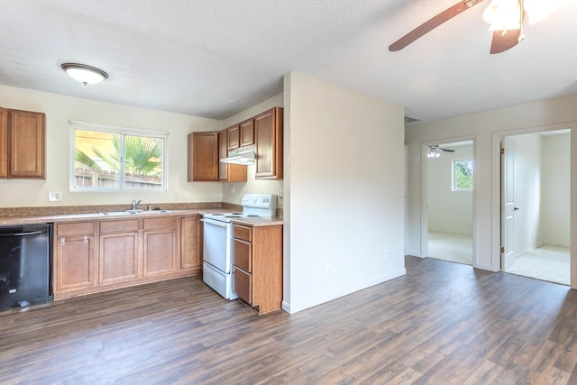 1535 Provo Ave, Shasta Lake, CA 96019 - kitchen with white electric range oven, dishwashing machine, ceiling fan, under cabinet range hood, and dark wood finished floors