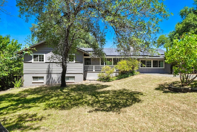 1448 Carter Way, Redding, CA 96002 - rear view of house with a lawn and solar panels