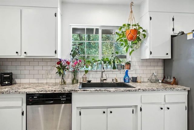 1448 Carter Way, Redding, CA 96002 - kitchen featuring stainless steel appliances, white cabinets, and decorative backsplash