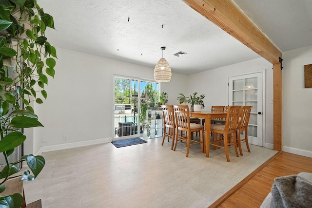 1448 Carter Way, Redding, CA 96002 - dining room with wood finished floors and a textured ceiling