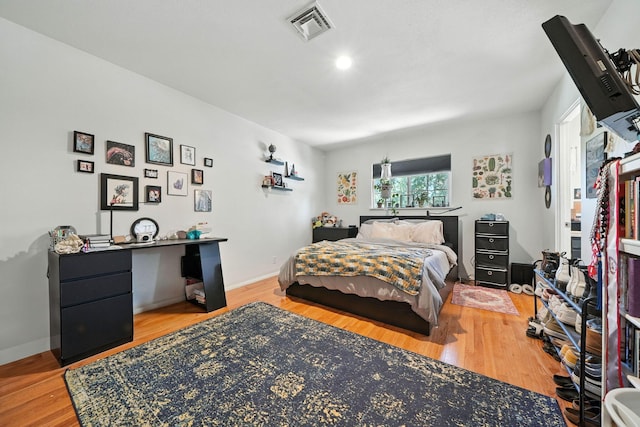 1448 Carter Way, Redding, CA 96002 - bedroom featuring wood finished floors and a desk