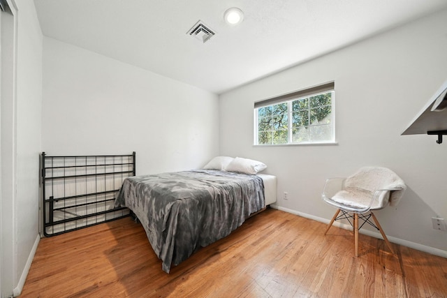 1448 Carter Way, Redding, CA 96002 - bedroom with baseboards and wood finished floors