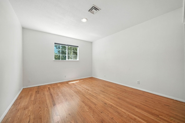 1448 Carter Way, Redding, CA 96002 - unfurnished room featuring light wood finished floors and recessed lighting
