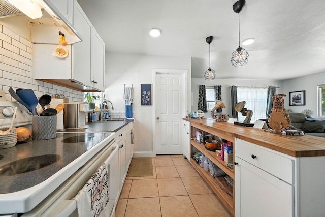 1448 Carter Way, Redding, CA 96002 - kitchen featuring wood counters, white electric range, decorative backsplash, white cabinetry, and recessed lighting
