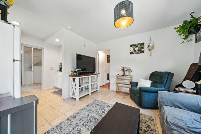 1448 Carter Way, Redding, CA 96002 - living area featuring light tile patterned floors and recessed lighting