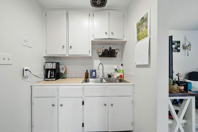 1448 Carter Way, Redding, CA 96002 - kitchen with white cabinetry and light countertops