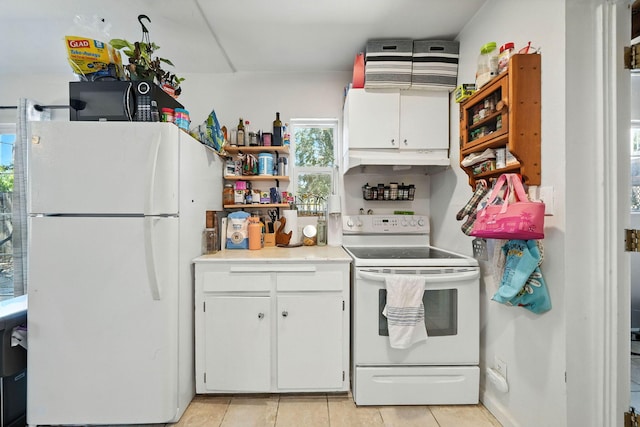 1448 Carter Way, Redding, CA 96002 - kitchen with white appliances, white cabinetry, light countertops, light tile patterned flooring, and under cabinet range hood