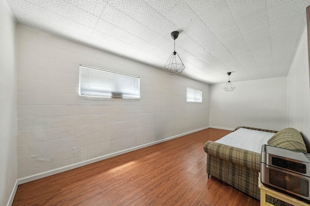 1448 Carter Way, Redding, CA 96002 - bedroom with baseboards and wood finished floors