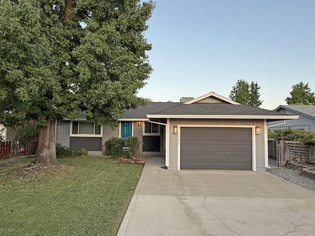 2855 Red Bud Ln, Anderson, CA 96007 - ranch-style home with driveway, a garage, and a shingled roof