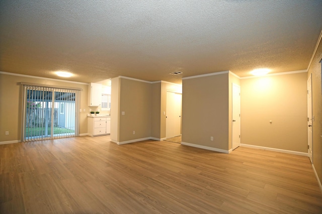 2855 Red Bud Ln, Anderson, CA 96007 - unfurnished room with a textured ceiling, ornamental molding, and light wood-style flooring
