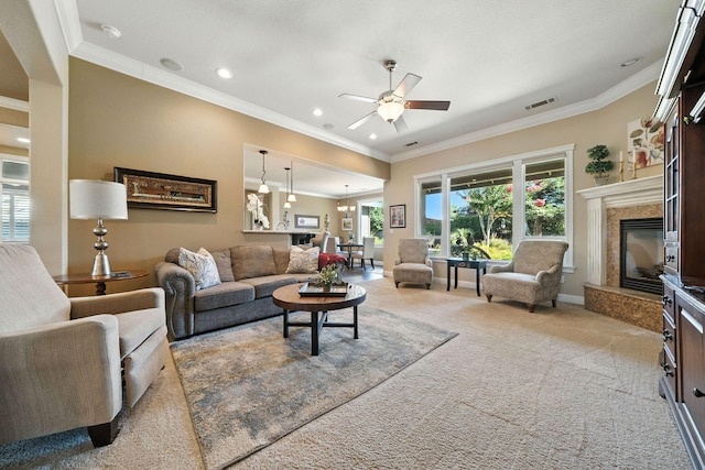 2110 Cilantro Dr, Redding, CA 96003 - living area featuring a ceiling fan, carpet, crown molding, a fireplace, and recessed lighting