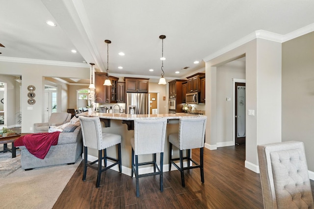 2110 Cilantro Dr, Redding, CA 96003 - kitchen with appliances with stainless steel finishes, a peninsula, ornamental molding, a kitchen bar, and glass insert cabinets
